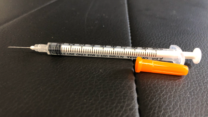 Methamphetamine Syringe and Needle on a car passenger seat
